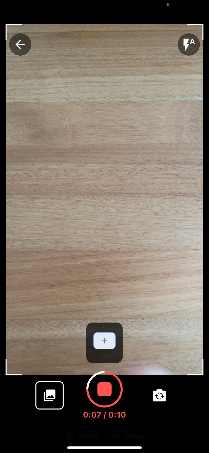 Camera in Video mode mid-recording with the progress ring and timer